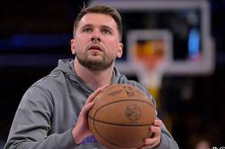 竞彩网首页-卢卡·东契奇在欧锦赛中狂砍37分，傲视全场